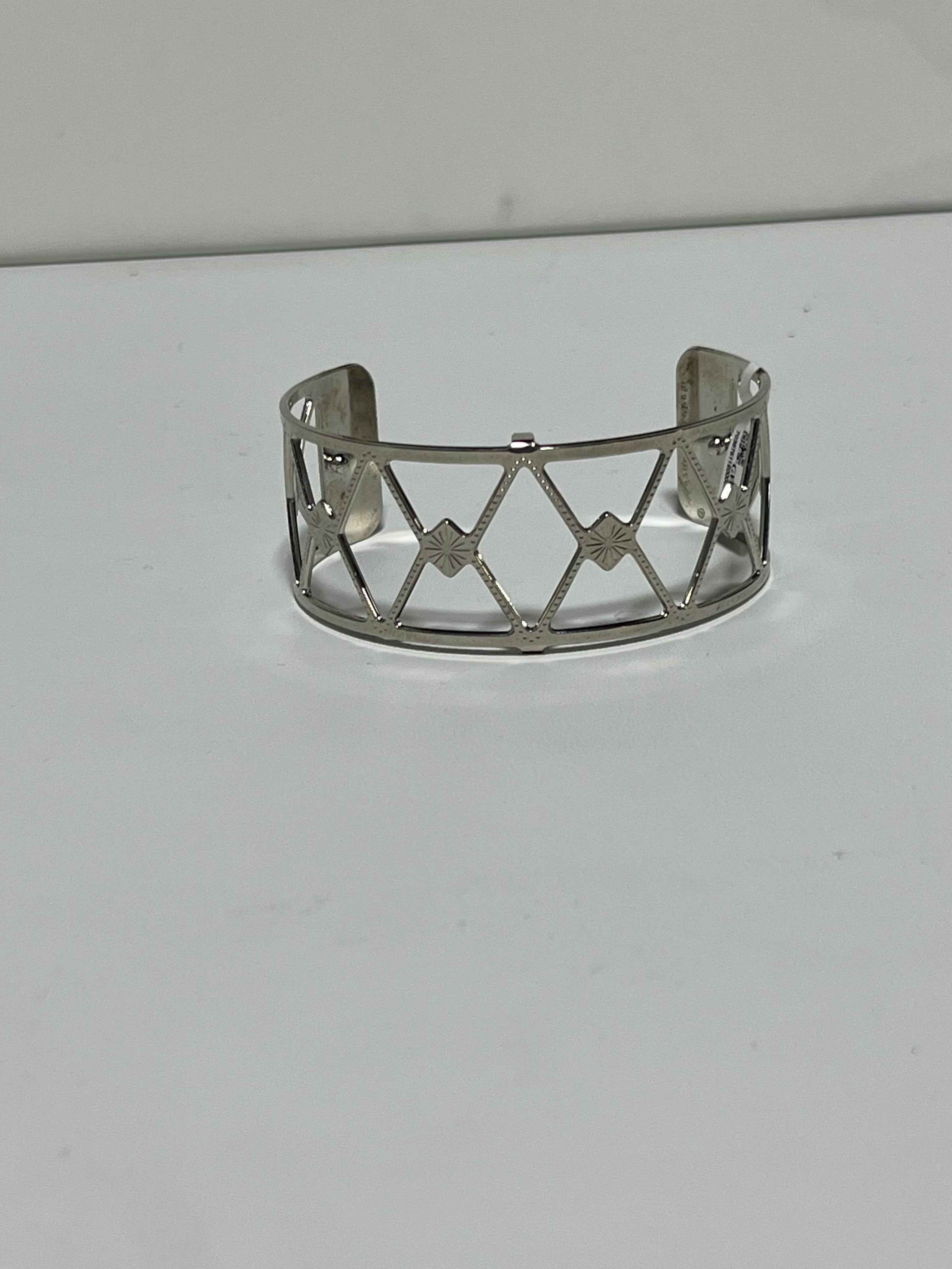 Bracelet manchette ajouré – métal argenté