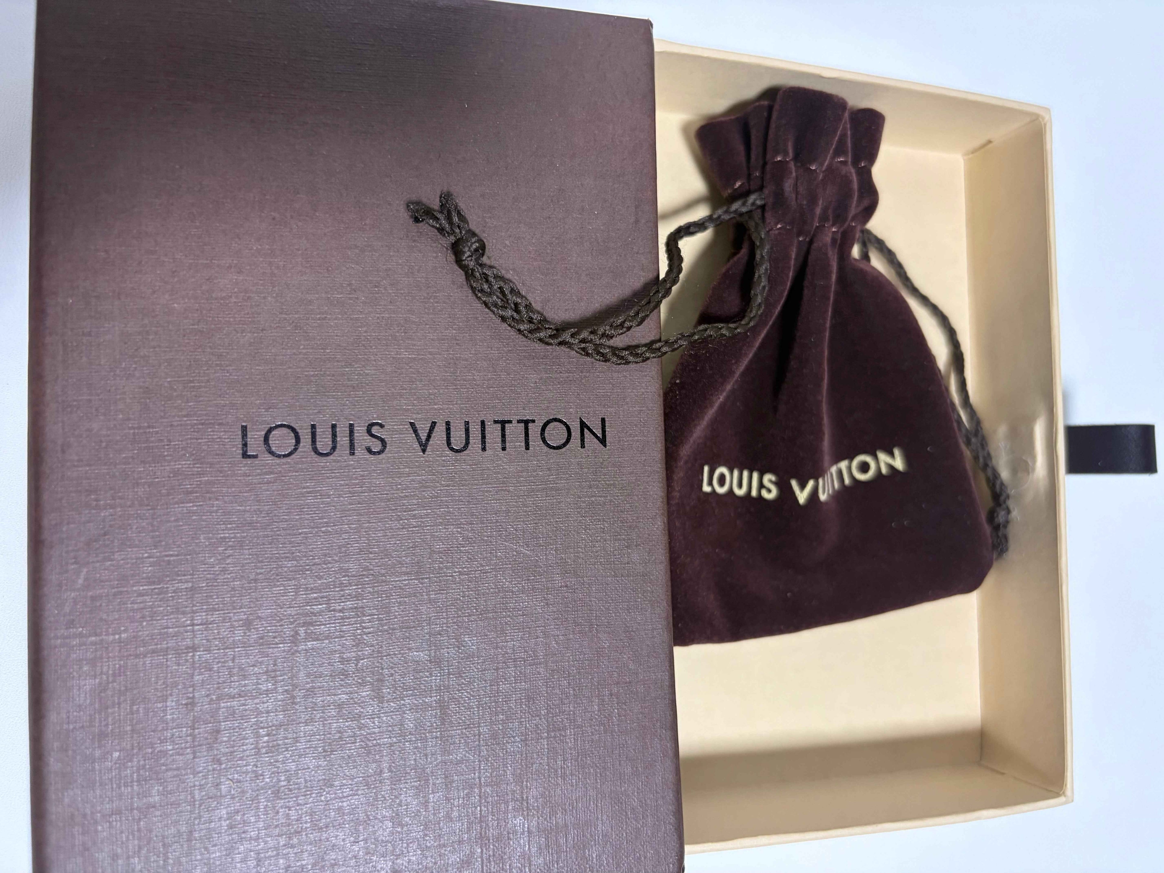 Bracelet Louis Vuitton – Métal doré & Dés strassés – 19 cm