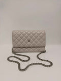 Pochette en cuir matelassé beige