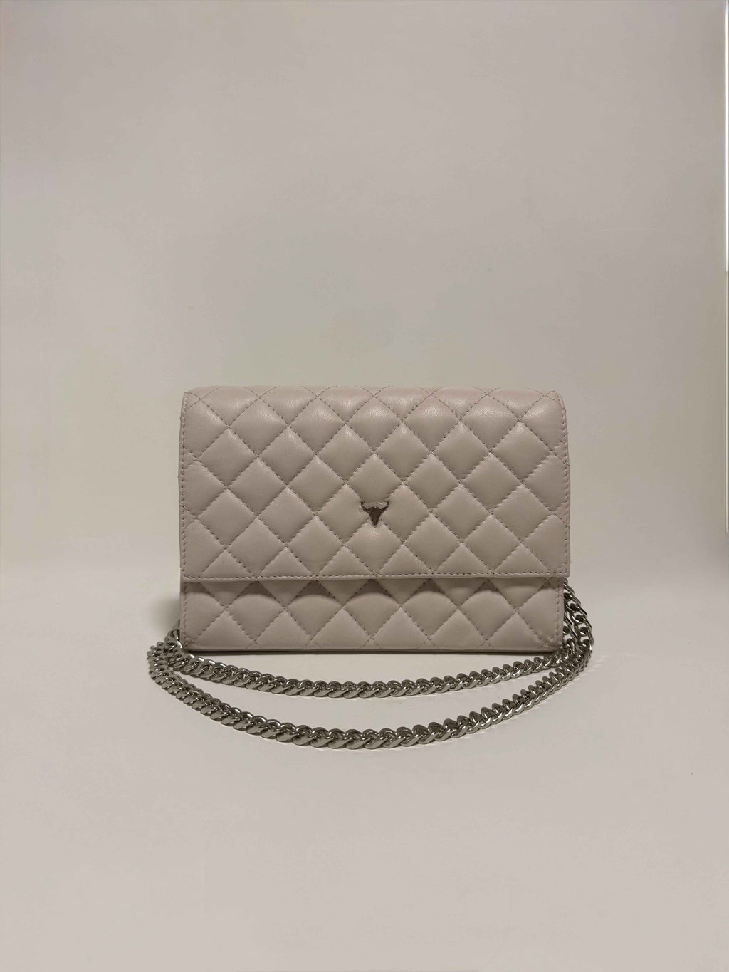 Pochette en cuir matelassé beige