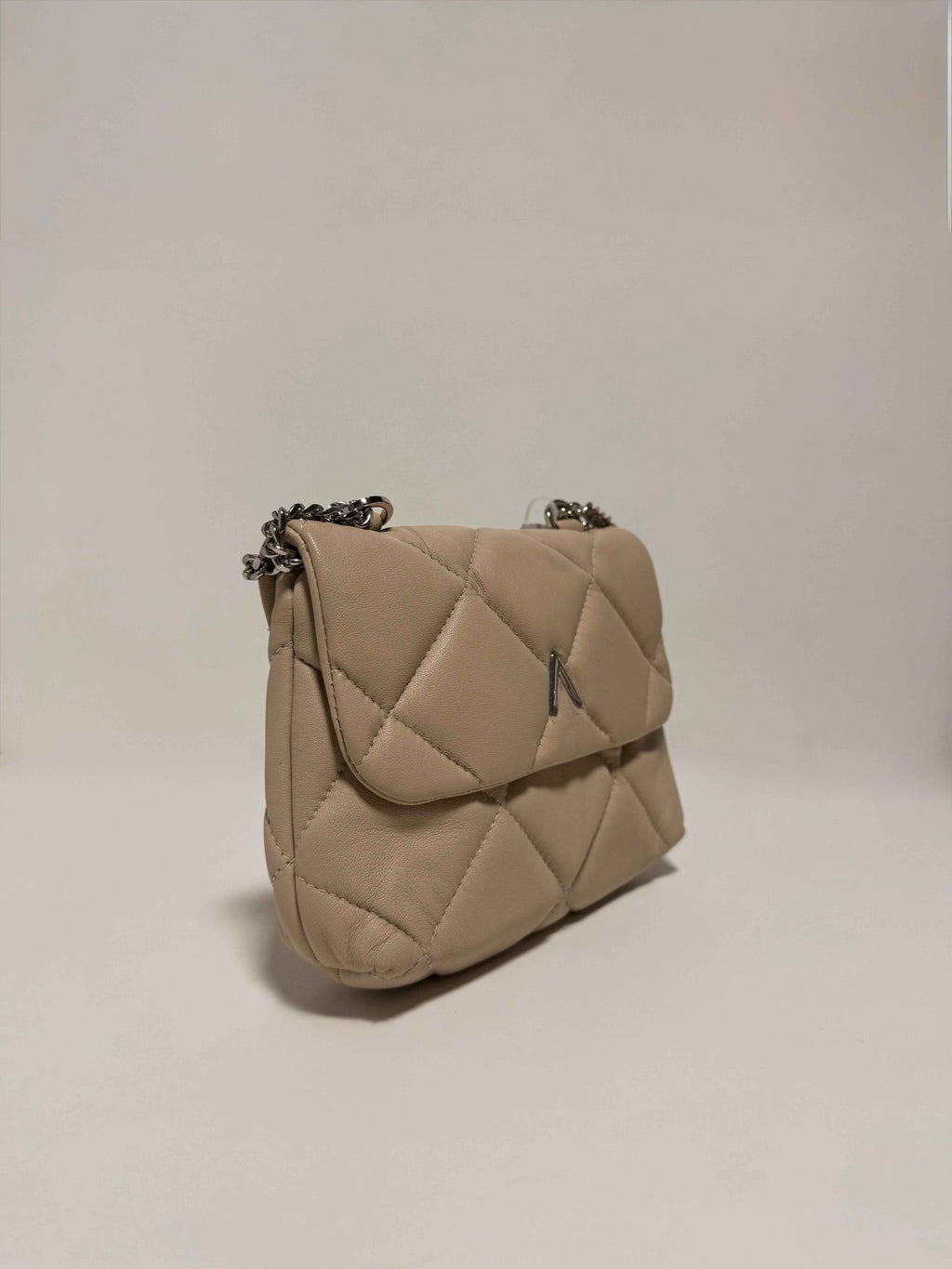 Sac en cuir beige matelassé