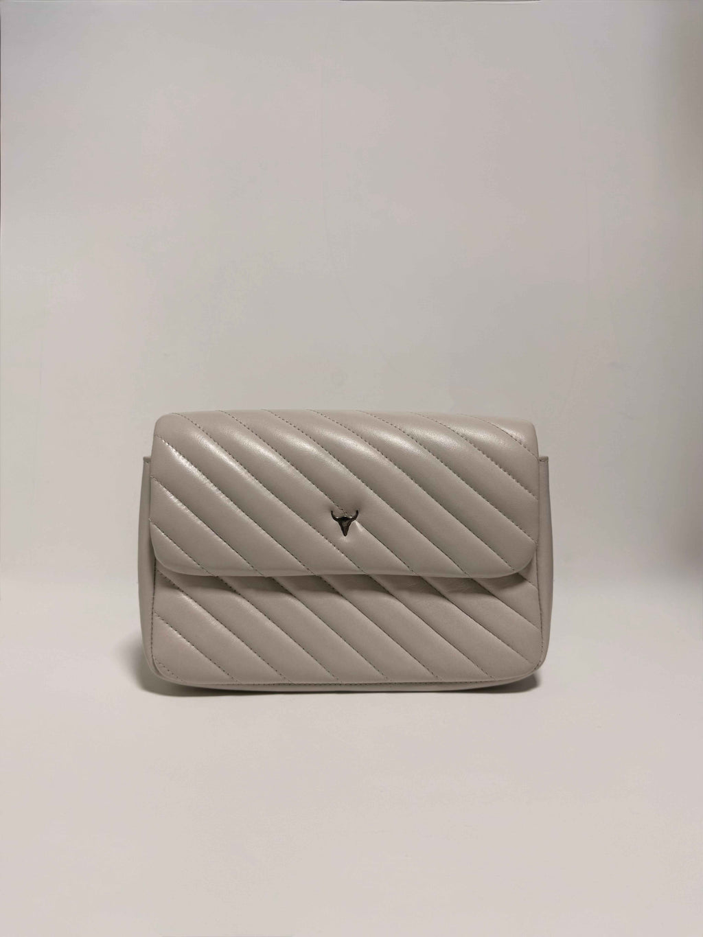 Petit sac bandoulière matelassé beige en cuir