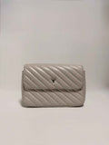 Petit sac bandoulière matelassé beige en cuir